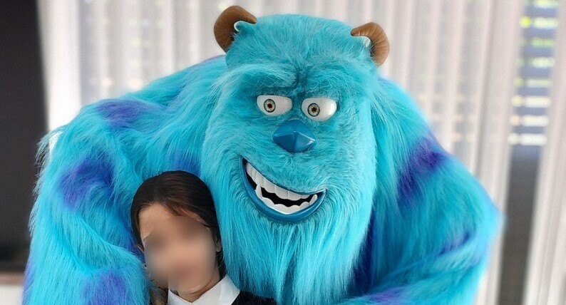 Kid with James P. Sullivan of Monsters, Inc.